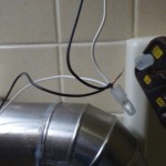 ガス給湯器取替工事　浴室リモコン施工中